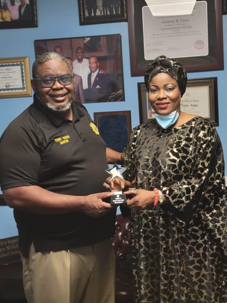 Africentral leadership receiving a community recognition award